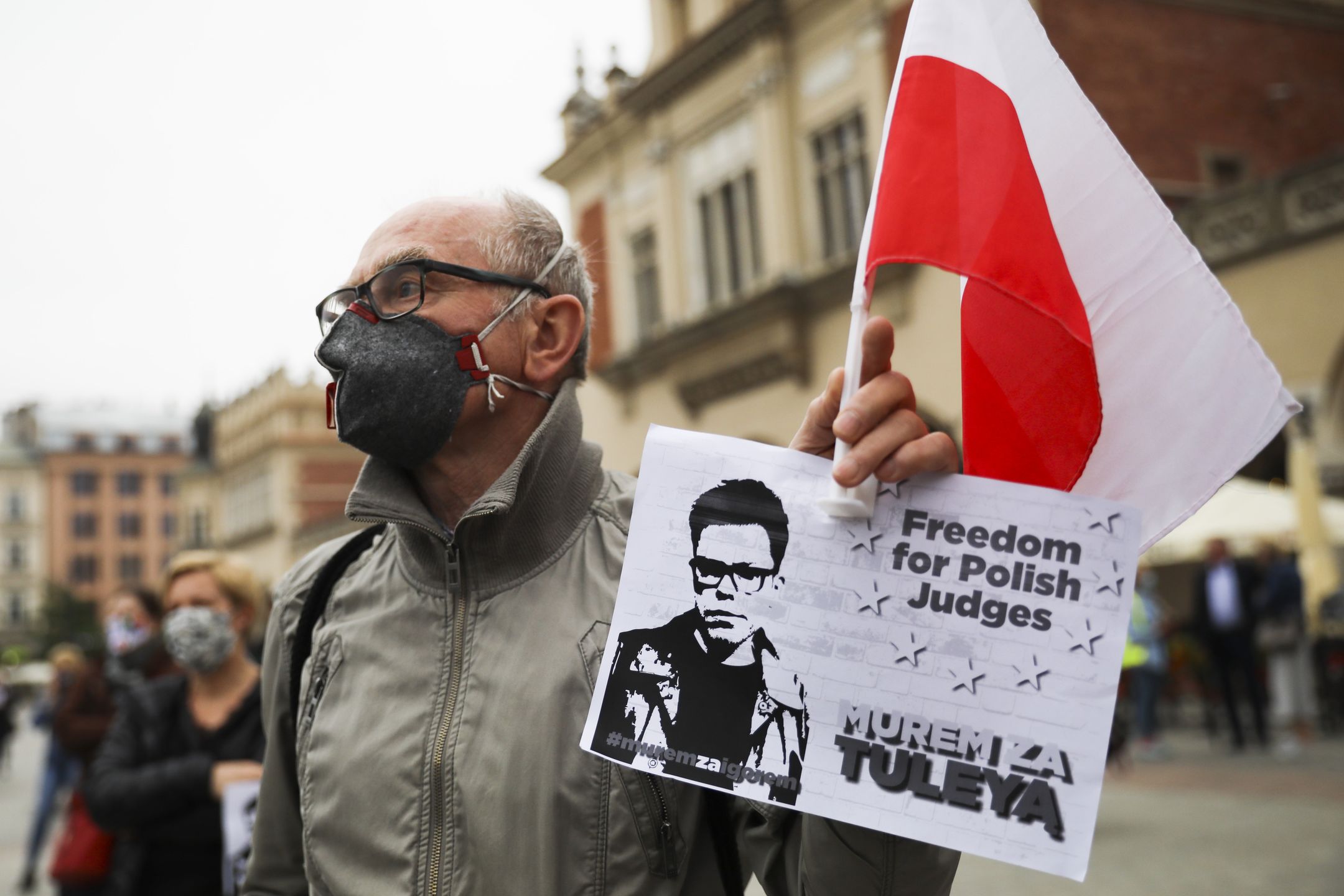 People protest at the Main Square to express support and solidarity with judge Igor Tuleya. Krakow, Poland on June 6, 2020. On June 9th, 2020 in Warsaw, the Supreme Court Disciplinary Chamber will conduct an unprecedented hearing on the revocation of judge Igor Tuleyas immunity. Judge Tuleya faces prosecution for having allowed the presence of media in a sensitive case concerning the investigations on the 2017 budget vote in the Polish House of Representatives (Sejm) that took place without the presence of the opposition. Judge Tuleya announced that he would not attend the hearing.  (Photo by Beata Zawrzel/NurPhoto via Getty Images)