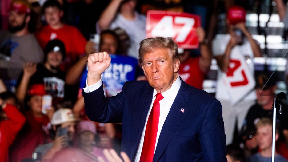 Former US President Donald Trump during a campaign event in Greensboro, North Carolina, US, on Tuesday, Oct. 22, 2024. Trump touted his pledge to provide tax breaks for purchasing cars, highlighting that the benefit would only apply to vehicles made in the US as he rallied voters in a crucial swing state with just two weeks until Election Day. Photographer: Cornell Watson/Bloomberg via Getty Images