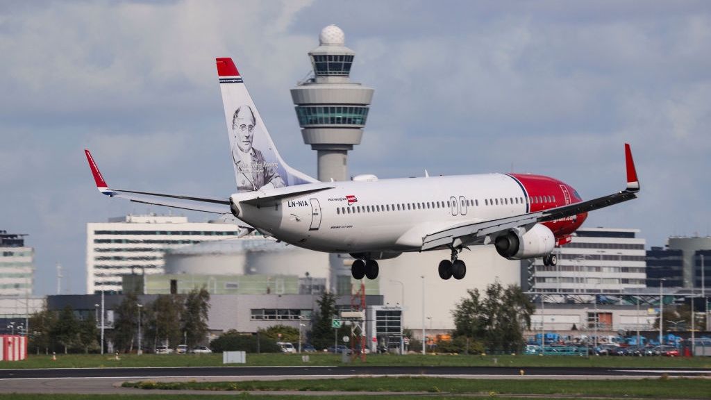 Norwegian Air Shuttle Boeing 737-800
A Norwegian Air Shuttle Boeing 737-800 landing at Amsterdam Schiphol International Airport, the Netherlands. Norwegian is a low cost carrier airline and third in size in Europe from Norway. The aircraft has the registration LN-NIA and is painted in a special livery of Johan Ludvig Runeberg. The airplane was manufactured in Renton, US. Norwegian is flying from Schiphol to Copenhagen, Helsinki, New YorkJFK, OsloGardermoen, StockholmArlanda. (Photo by Nicolas Economou/NurPhoto via Getty Images)
NurPhoto
Norwegian, Air, Shuttle, Boeing, 737-800, Norwegian Air Shuttle, LN-NIA, low cost, low, cost, carrier, europe, eu, USA, Amsterdam, Netherlands, Dutch, Schiphol, EHAM, AMS, Landing, fly, flying, johan, ludvig, runeberg, airplane, aircraft, airliner, fuselage, clouds, cloudy, summer, charter, day, blue, sky, red, engine, wing, winglets, boeing, 738, nicolas economou, livery, paint, landing gear, control tower, airport, new york, stockholm, arlanda, oslo, fardermoen, helsinki, copenhagen, dy, nax, nor shuttle, norwegian air, long haul, subsidiaries, jet, body, wide, narrow, hub, base, norway, passengers, pax, economy, business, financial, economical, aviation, holidays, vacations, transportation, modern, dy4532, dy4531, airline, narrow body aircraft, boeing 737, aircraft engine, boeing c 40 clipper