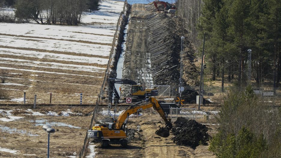 Temporary
Excavators work at a construction site of the border barrier fence between Finland, right, and Russia near Pelkola border crossing point in Imatra, south-eastern Finland, Friday, April 14, 2023. (AP Photo/Sergei Grits)
Sergei Grits