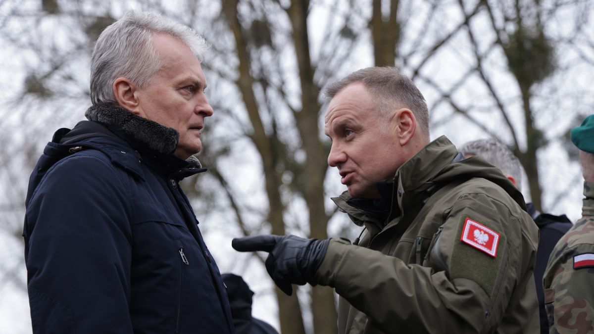 GNIEW, POLAND - MARCH 05: Lithuanian President Gitanas Nauseda (L) and Polish President Andrzej Duda speak with one another at the NATO Dragon 24 military exercise on March 05, 2024 near Gniew, Poland. Dragon 24 is involving troops from 10 different nations and is part of Steadfast Defender, an ongoing set of NATO military manoeuvres across Europe that is involving 90,000 troops. (Photo by Sean Gallup/Getty Images)