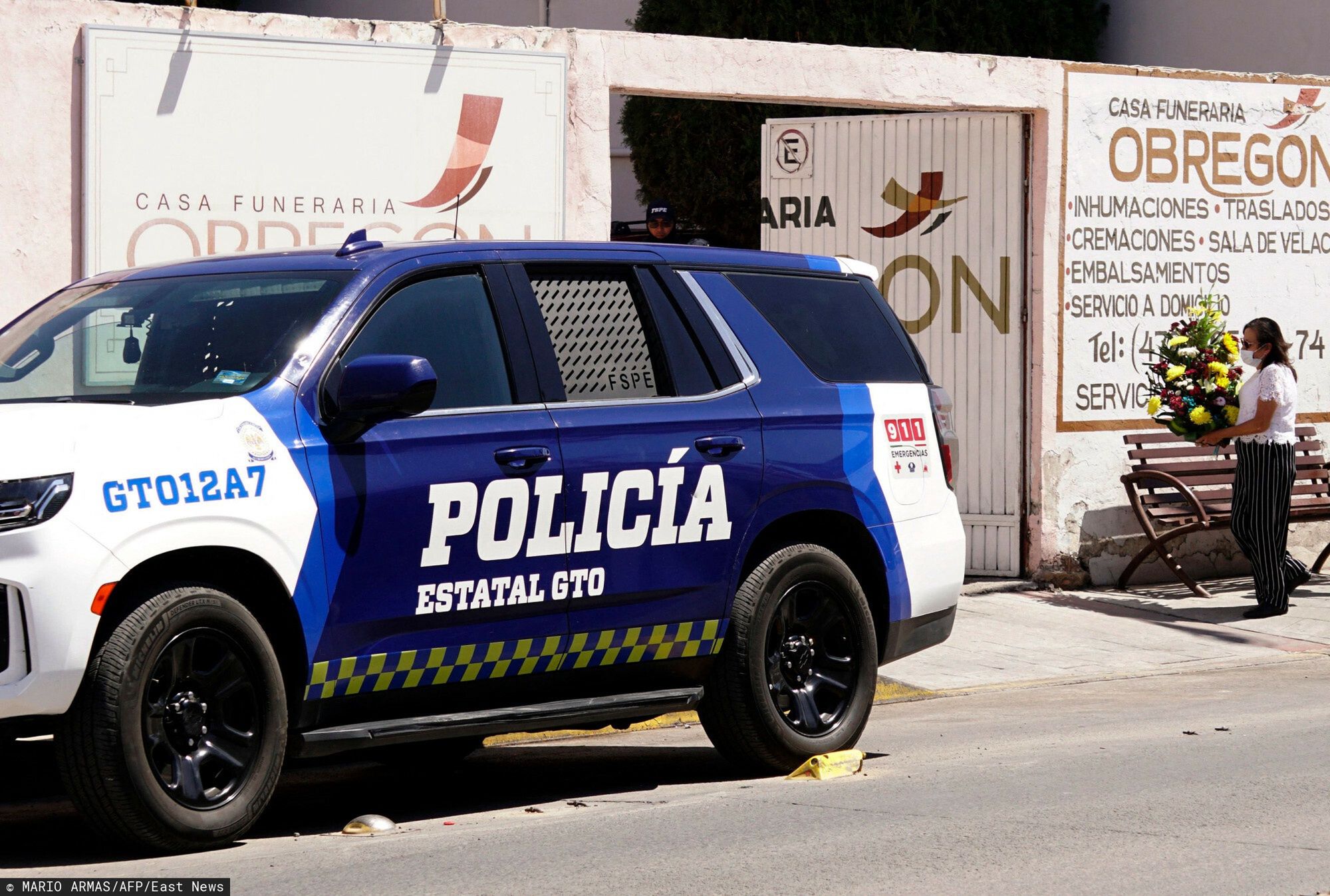 Temporary
A Guanajuato state police patrol vehicle guards the funeral of journalist Kristian Zavala, who was shot dead along with another person early Sunday morning, in the municipality of Silao, Guanajuato State, Mexico, on March 3, 2025. Journalist Kristian Uriel Martinez Zavala, who ran a Facebook news page, was murdered in the early hours of March 2 in the central Mexican state of Guanajuato, local authorities reported. (Photo by Mario ARMAS / AFP)
MARIO ARMAS