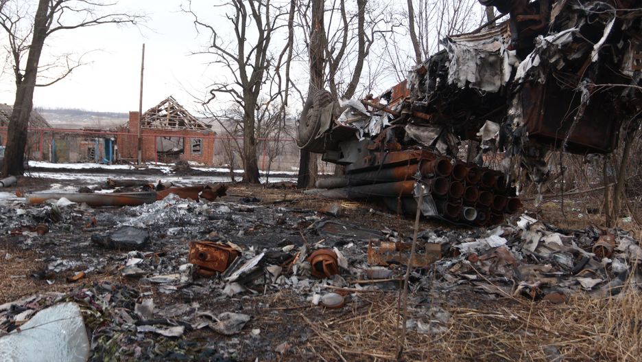DONETSK OBLAST, UKRAINE - FEBRUARY 25: Wreckage of the BM-21 “Grad” multiple rocket launcher lies in front of destroyed house on February 25, 2023 in Donetsk Oblast, Ukraine. After the withdrawal of Ukrainian troops from Soledar, the main confrontation with the Russian army and its mercenaries take place in February on the outskirts of the city of Bakhmut in the Donetsk Oblast. (Photo by Yan Dobronosov/Global Images Ukraine via Getty Images)