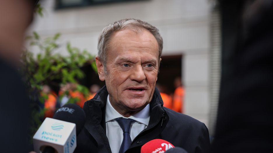 Donald Tusk, former president of the European Union (EU) and leader of Poland's Civic Coalition, with members of the media after meeting leaders from the European People's party in Brussels, Belgium, on Thursday, Oct. 26, 2023. Tusk's top priority is to fix frayed relations with Brussels and unlock access to funds frozen by the EU over the outgoing cabinet's rule of law infringements. Photographer: Simon Wohlfahrt/Bloomberg via Getty Images