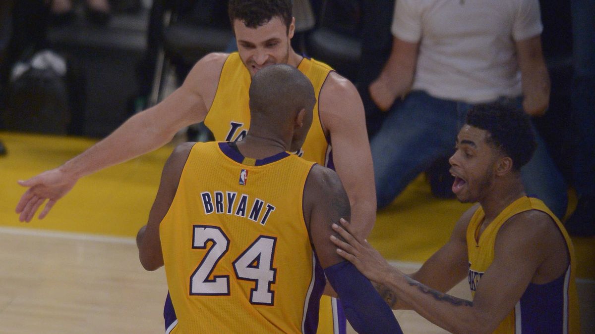 LOS ANGELES, CA - April 13: Kobe Bryant is congratulated after his last shot from the field. Bryant scored 60 points in his final game as a Los Angeles Laker, as the Lakers defeated the Utah Jazz 101-96. April 13, 2016. Los Angeles, CA. (Photo by John McCoy/MediaNews Group/Los Angeles Daily News via Getty Images)