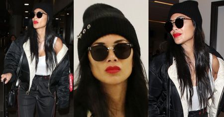 Czarno-biała Nicole Scherzinger wydyma czerwone usta na lotnisku w LA