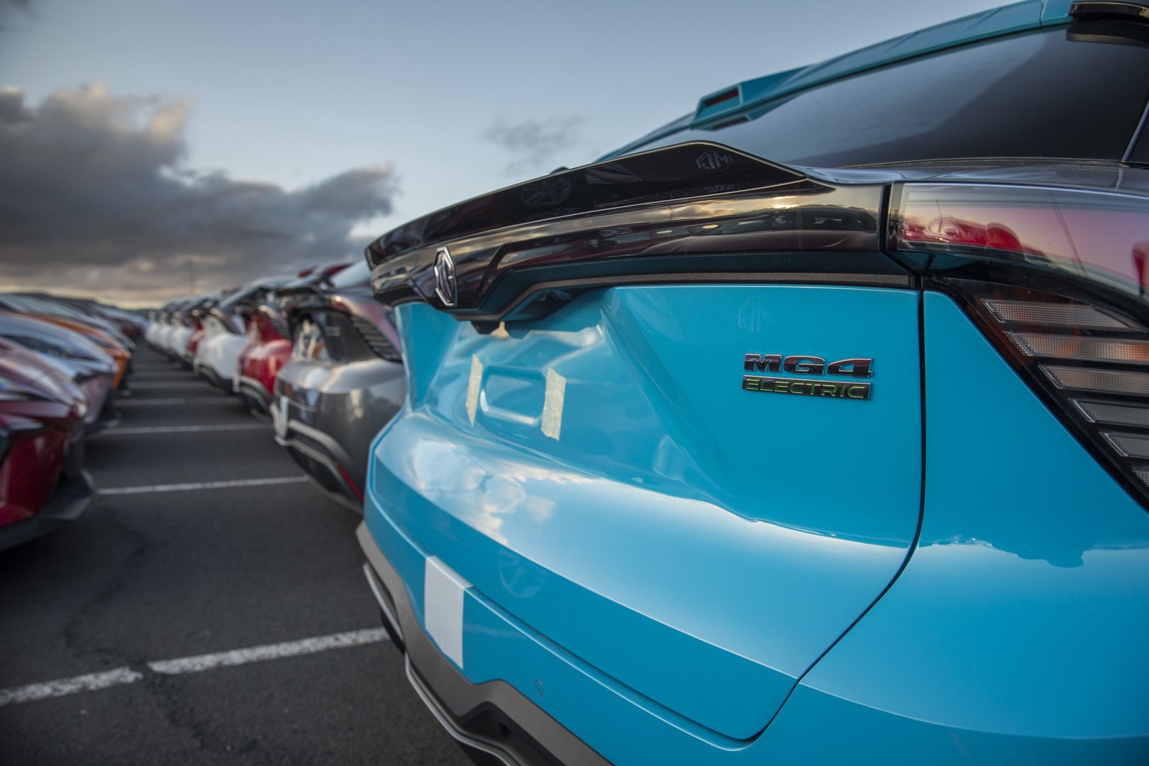 An MG Motor MG4 electric vehicle parked in a lot at Port Kembla vehicle terminal in Port Kembla, Australia, on Saturday, Sept. 2, 2023. The venerable UK automaker is thriving again, under Chinese owners, Shanghai Automotive Industry Corp., which in 2007 acquired the brand and a factory in the English city of Longbridge. MG sold 115,000 cars in Europe in the first half of 2023, more than double the total for the same period last year. Photographer: Brent Lewin/Bloomberg via Getty Images