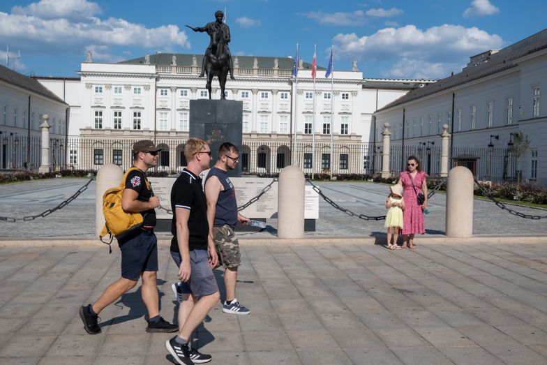 WARSAW, POLAND - 2024/08/17: People walk in front of Presidential Palace in Warsaw. The Presidential Palace, located on Krakowskie Przedmiecie Street in central Warsaw, serves as the official residence of the President of Poland. Built in 1643 as a mansion for Polish aristocrats, the 17th-century structure has undergone extensive renovations over the years. Today, it is a popular tourist destination, offering public tours. (Photo by Tomas Tkacik/SOPA Images/LightRocket via Getty Images)