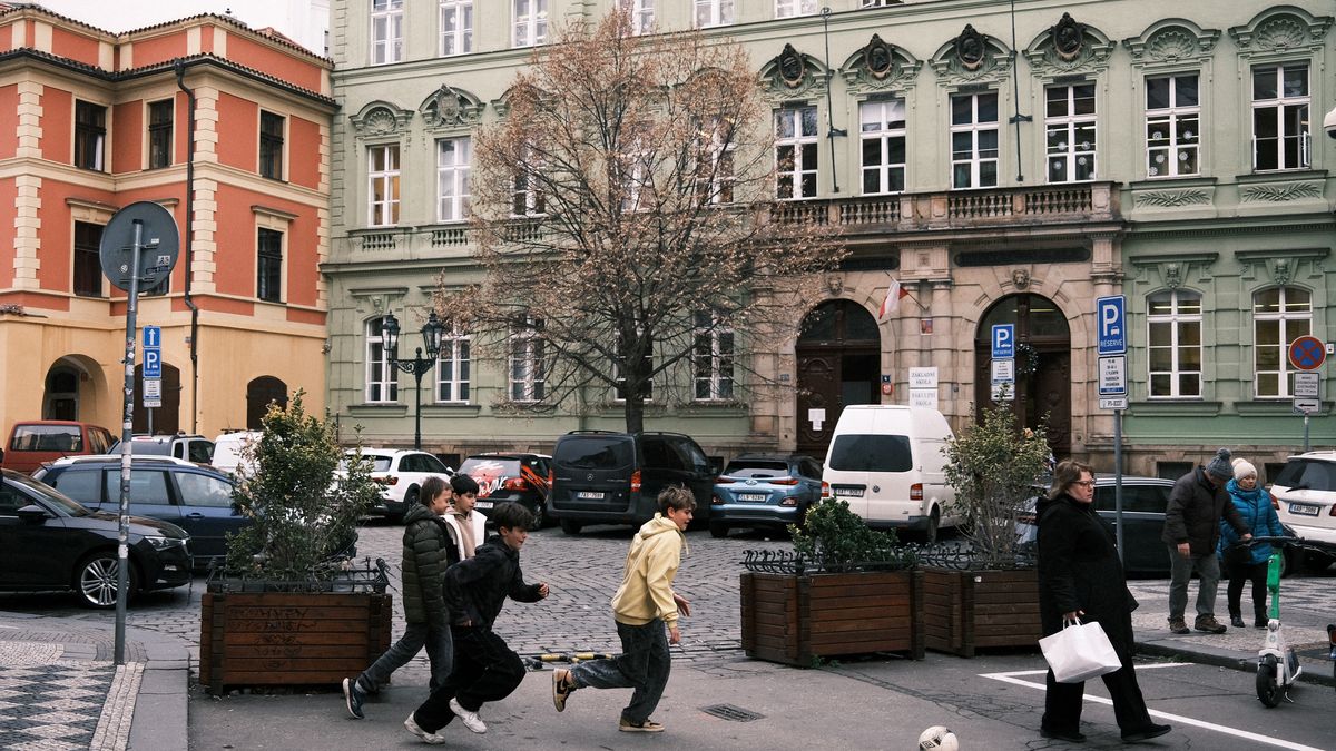 PRAGUE, CZECH REPUBLIC - DECEMBER 12: People play football in the streets prior to the UEFA Europa League 2024/25 League Phase MD6 match between SK Slavia Praha and RSC Anderlecht at Eden Arena on December 12, 2024 in Prague, Czech Republic. (Photo by Alex Pantling - UEFA/UEFA via Getty Images)
