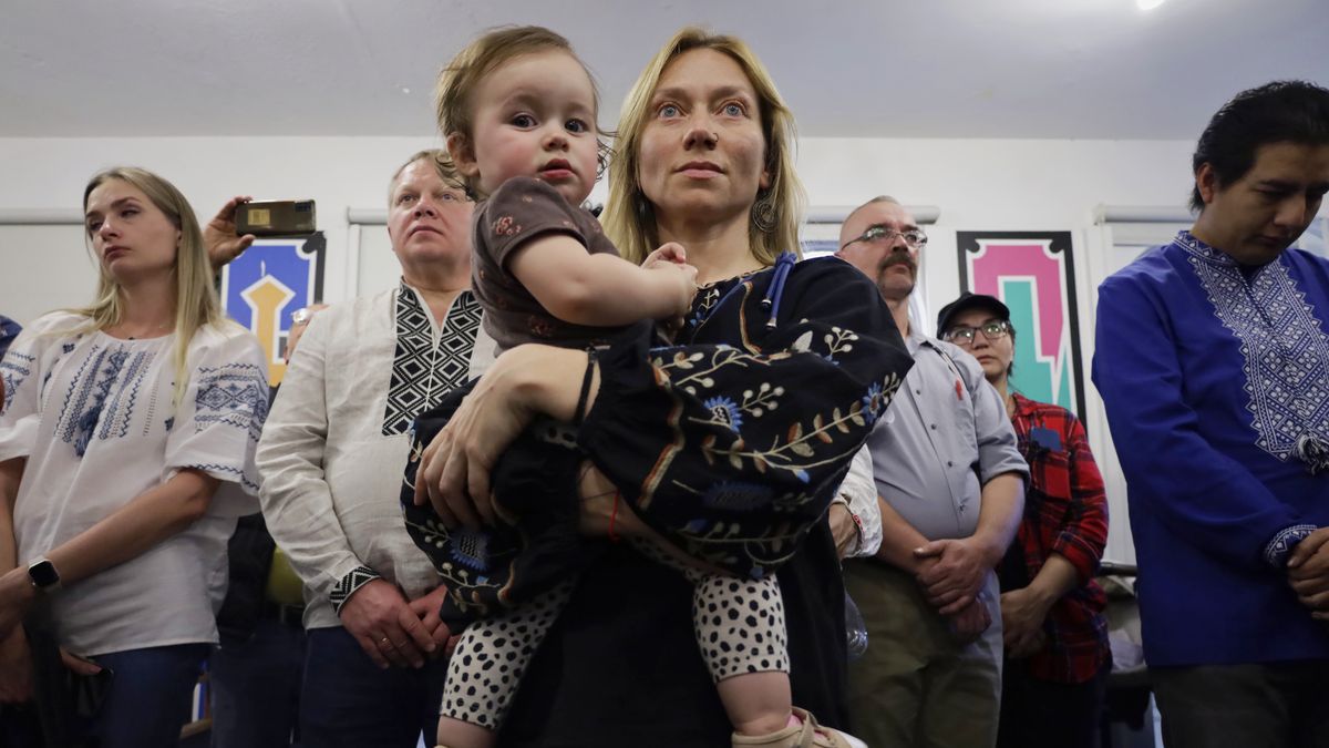 A mother and daughter of Ukrainian origin are participating in a political and cultural event at the Ukrainian-Mexican Cultural Center in Mexico City, protesting against Russian President Vladimir Putin, following his order to start a strategic and military offensive in several cities in Ukraine two years ago, where many people have lost their lives and others have been displaced. (Photo by Gerardo Vieyra/NurPhoto via Getty Images)