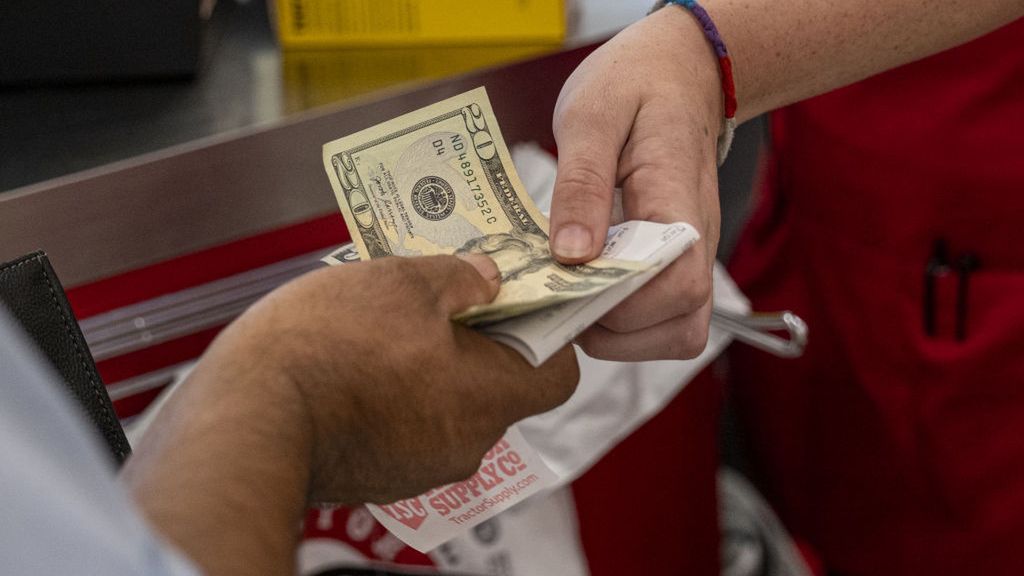 Tractor Supply Co. Ahead Of Earnings Figures
A customer pays cash for a purchase at a Tractor Supply Co. store in Merced, California, US, on Tuesday, July 19, 2022. Tractor Supply Co. is expected to release earnings figures on July 21. Photographer: David Paul Morris/Bloomberg via Getty Images
Bloomberg
u.s.a., americas, u.s., us, united states of america, earns, earnings, american, consumer goods, consumer products, industries, corporate finance, north american, consumer staples, business news, finance, financial