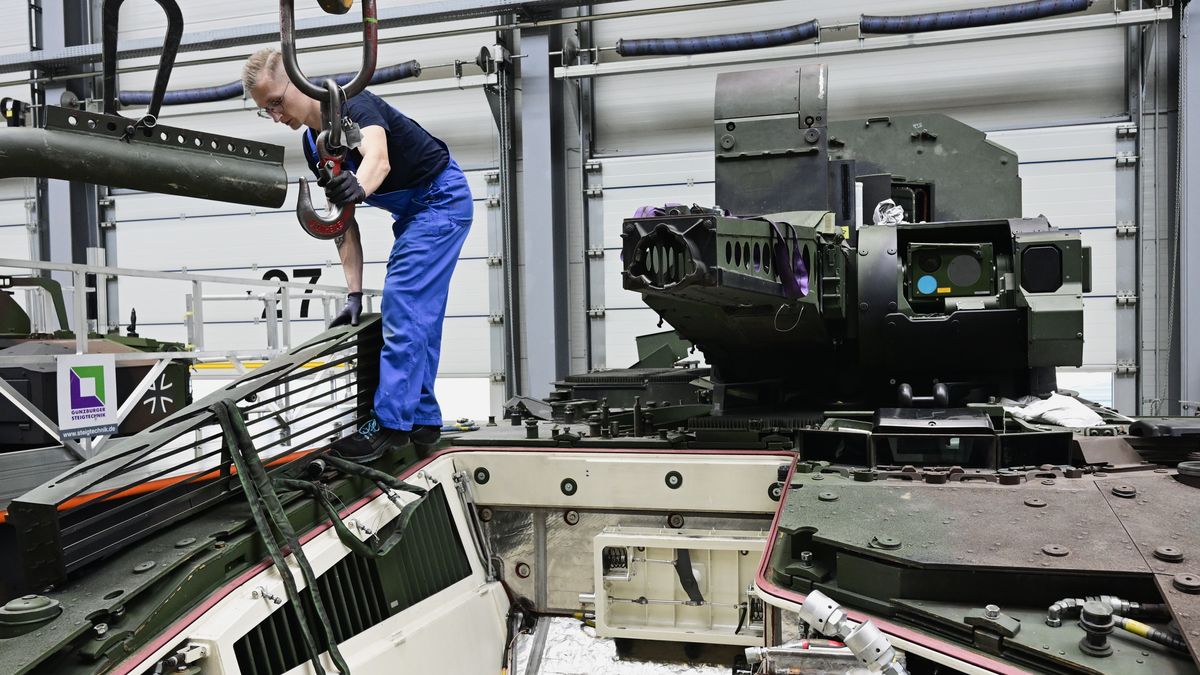 UELZEN, GERMANY - FEBRUARY 12: An employee works by a Puma fighting vehicle at a production line as German Chancellor Olaf Scholz and Defence Minister Boris Pistorius attend the groundbreaking ceremony for a new munitions factory of German defence contractor Rheinmetall on February 12, 2024 in Unterluess, Germany. The war in Ukraine has been a boon to Rheinmetall as Germany seeks to provide Ukraine with munitions, including artillery shells, and also increase its own supply. (Photo by Fabian Bimmer - Pool/Getty Images)