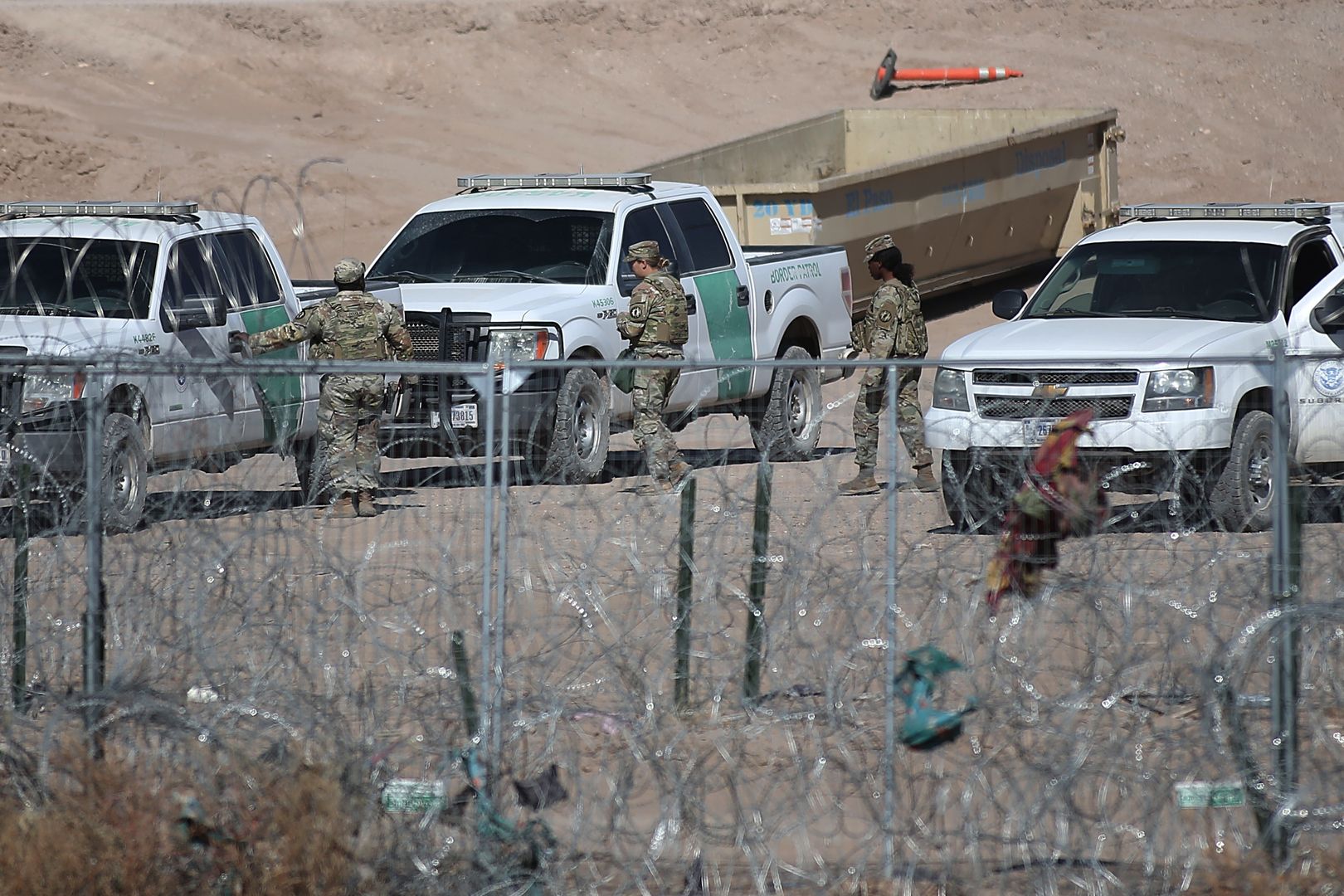 CIUDAD JUAREZ , MEXICO - JANUARY 27: Military personnel from the U.S. Army's Ranger unit stationed in multiple Border Patrol units are seen along the border separating Ciudad Juarez and El Paso in Ciudad Juarez, Mexico on January 27, 2025. In the vicinity of Gate 36, as well as at other points along the border between Mexico and the United States, the agents were seen as part of a convoy of 10 units that drove at high speed along the border perimeter. This Saturday, according to personnel from the Fort Bliss military base in El Paso, more than a thousand soldiers arrived with the task of joining the border surveillance efforts also carried out by the Texas National Guard. (Photo by Christian Torres/Anadolu via Getty Images)