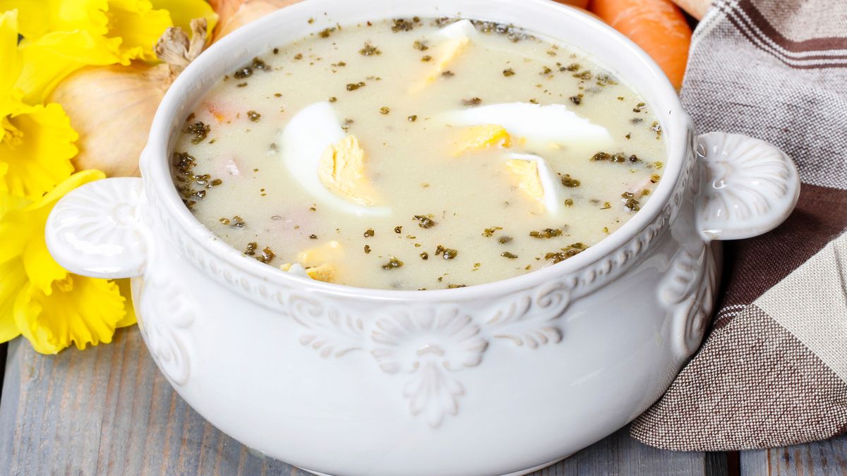 The sour rye soup made of soured rye flour and meat (usually boiled pork sausage or pieces of smoked sausage, bacon or ham)bacon, boiled, borscht, bouquet, bowl, carrot, cookbook, cooking, cuisine, czech, daffodils, delicacy, dinner, easter, egg, festive, flour, food, fresh, ham, homemade, hot, kitchen, kyselo, lunch, meal, meat, napkin, polish, porcelain, pork, potato, recipe, rye, sausage, serviette, serving, slovakia, smoked, soup, sour, spring, table, traditional, tureen, vase, white, wooden, zur, bacon, boiled, borscht, bouquet, bowl, carrot, cookbook, cooking, cuisine, czech, daffodils, delicacy, dinner, easter, egg, festive, flour, food, fresh, ham, homemade, hot, kitchen, kyselo, lunch, meal, meat, napkin, polish, porcelain, pork, potato, recipe, rye, sausage, serviette, serving, slovakia, smoked, soup, sour, spring, table, traditional, tureen, vase, white, wooden, zur