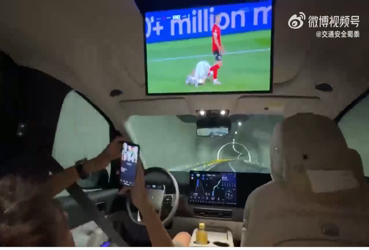 He was watching the game while driving.