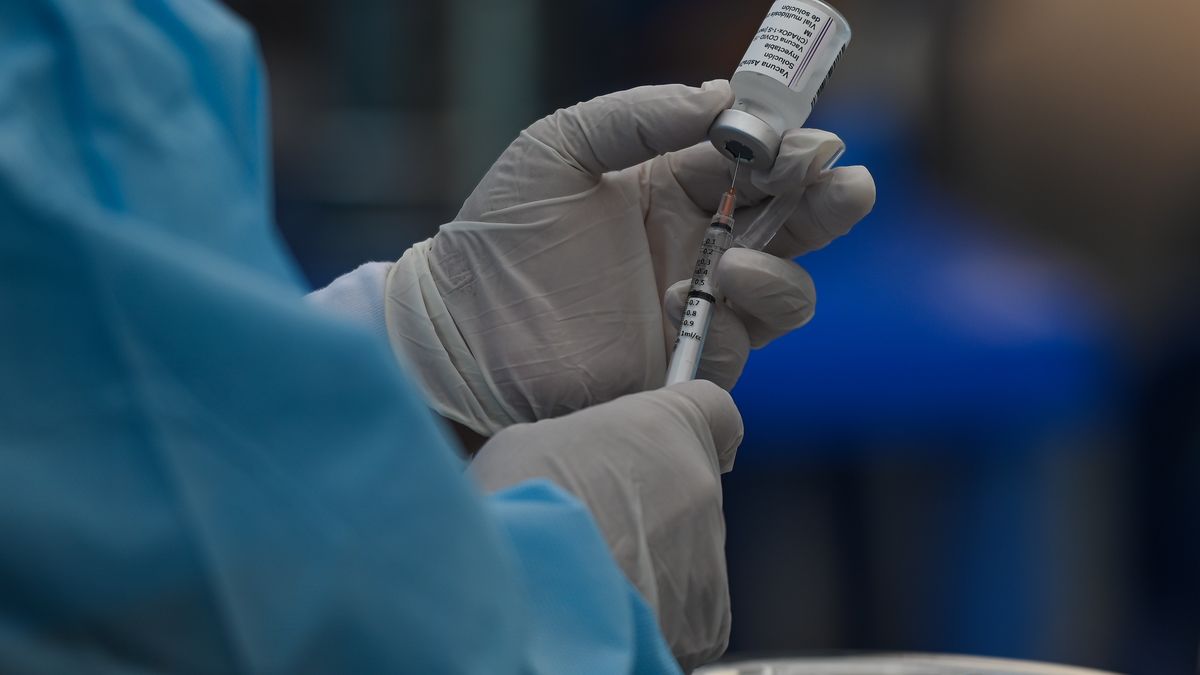 A nurse prepares the Oxford, AstraZeneca COVID-19 vaccine for use at the walk-in vaccination centre in in Lima city center. 
On Wednesday, March 30, 2022, in Lima, Peru. nurse prepares the Oxford, AstraZeneca COVID-19 vaccine for use at the walk-in vaccination centre in in Lima city center. 
On Wednesday, March 30, 2022, in Lima, Peru. (Photo by Artur Widak/NurPhoto via Getty Images)