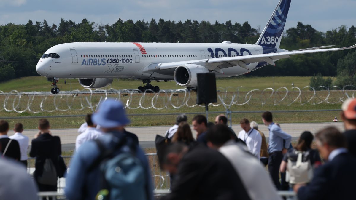 SCHOENEFELD, GERMANY - JUNE 11: An Airbus A350-1000 passenger plane stands at the 2026 ILA Berlin Air Show on June 11, 2026 in Schoenefeld, Germany. This year's ILA has a heavy emphasis on defence and drone technology and the integration of artificial intelligence. (Photo by Sean Gallup/Getty Images)