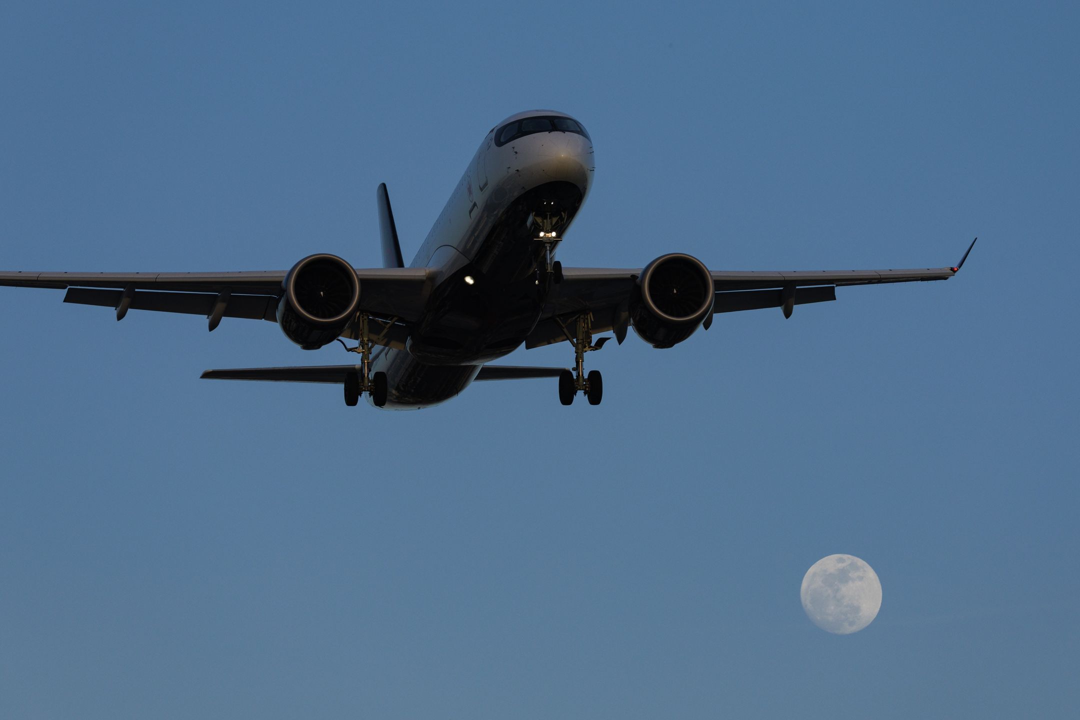 SAN DIEGO, CALIFORNIA - MAY 10: An Air Canada Airbus A220 approaches San Diego International for a landing from Montreal on May 10, 2025 in San Diego, California.  (Photo by Kevin Carter/Getty Images)