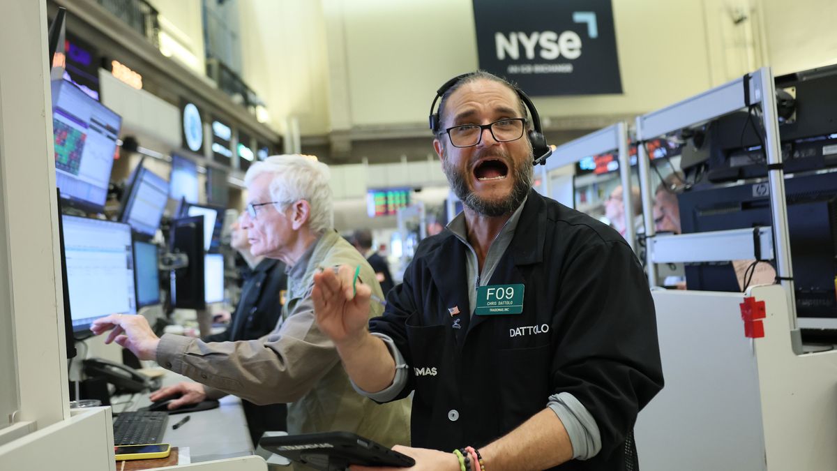 NEW YORK, NEW YORK - FEBRUARY 20: Traders work on the floor of the New York Stock Exchange during afternoon trading on February 20, 2026 in New York City. Stocks closed on the rise with the Dow Jones adding 200 points as well as recovering the 200 points lost at opening amid a weak gross domestic product for the fourth quarter. The Supreme Court ruled 6-3 on a decision against President Donald Trump’s tariffs.  (Photo by Michael M. Santiago/Getty Images)