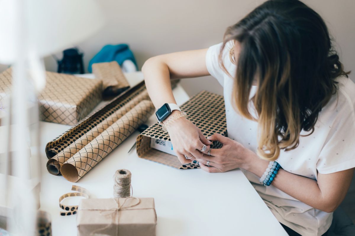 Wrapping gifts in paper before the holidays