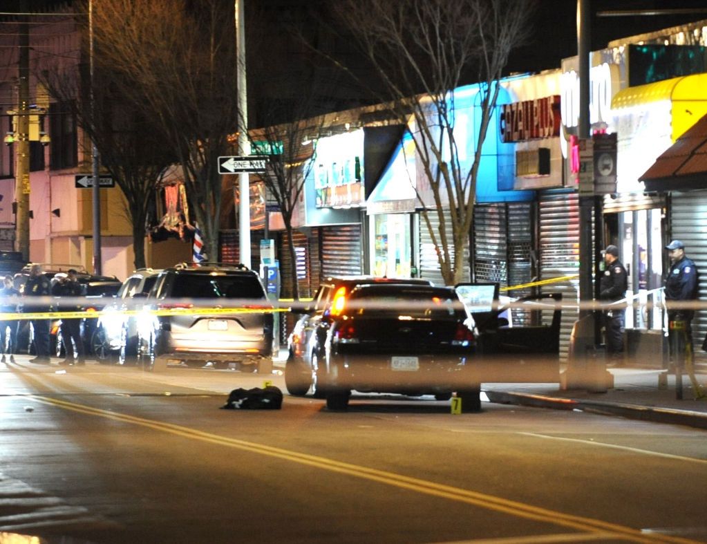 US-NEWS-NYPD-OFFICER-SHOT-NY
Police secure the vehicle in front of 1919 Mott Ave., Far Rockaway, from which a New York Police Department officer was shot while making a car stop on Monday, March 25, 2024, in New York City. (Sam Costanza/New York Daily News/Tribune News Service via Getty Images)
New York Daily News