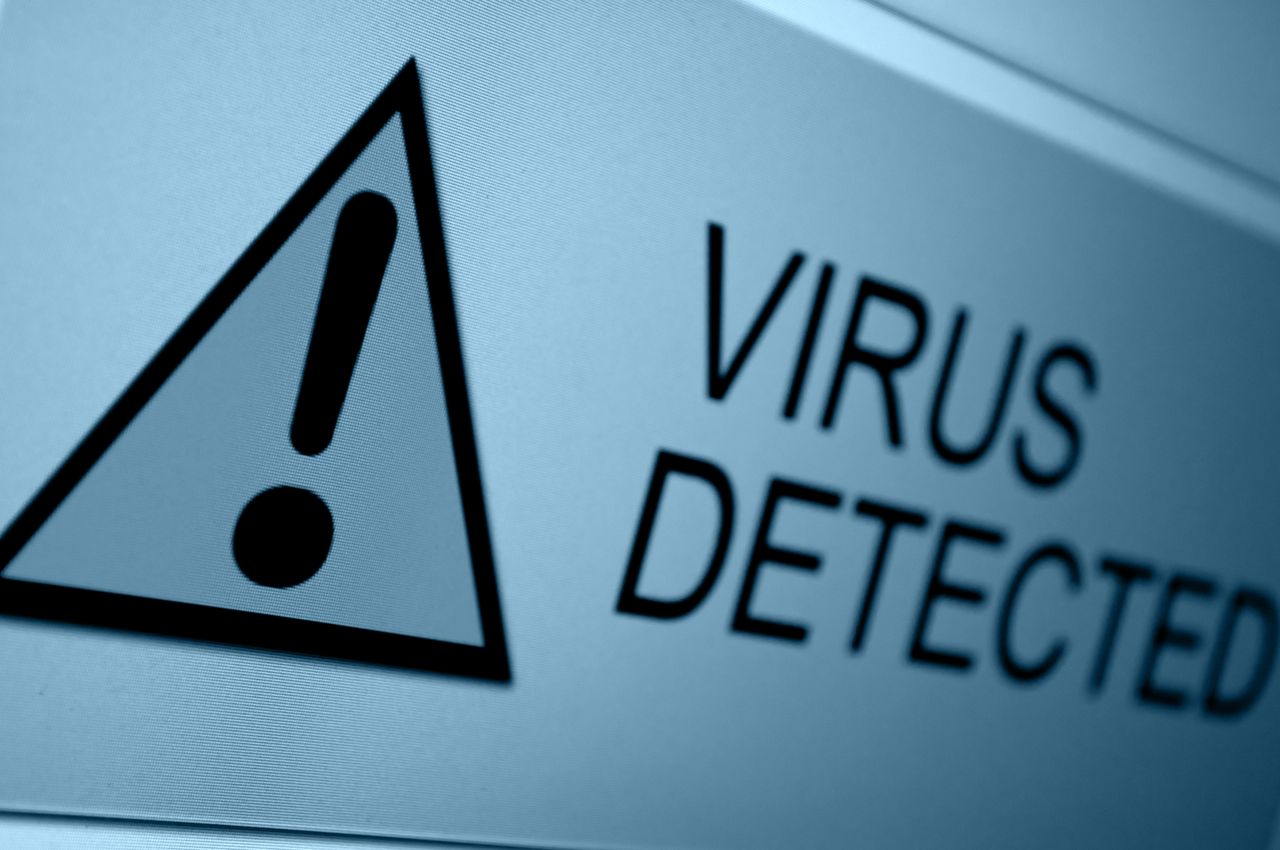 Closeup of Virus Detected Sign on LCD Screen