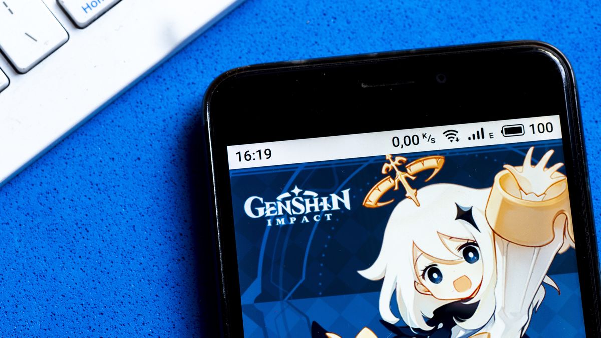 UKRAINE - 2020/10/04: In this photo illustration a Genshin Impact app by miHoYo Limited logo is seen displayed on a smartphone. (Photo Illustration by Igor Golovniov/SOPA Images/LightRocket via Getty Images)