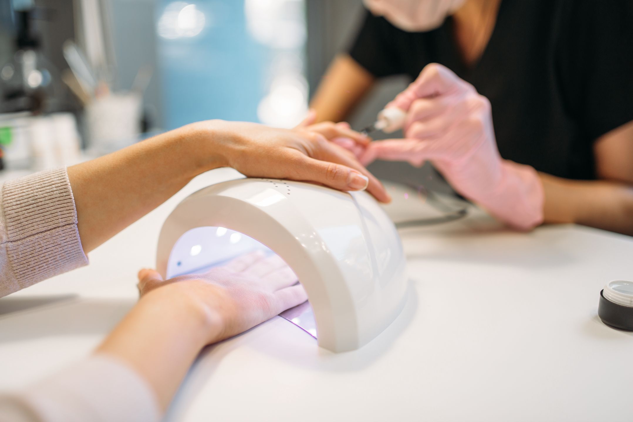 Female client dries gel varnish in the nail dryer
Female client dries gel varnish in the nail dryer, beautician in pink gloves on background, beauty salon. Manicurist doing hand care cosmetic procedure
manicure, hand, beauty, care, nail, female, finger, fingernail, salon, beautician, treatment, beautiful, people, cosmetic, woman, relaxation, polish, human, lifestyle, spa, luxury, elegance, manicurist, making, wellness, health, person, procedure, clean, closeup, women, applying, pampering, girl, skin, enamel, body, fashion, brush, service, french, file, paint, two, acrylic, femininity, polishing, client, studio, manicure, hand, beauty, care, nail, female, finger, fingernail, salon, beautician, treatment, beautiful, people, cosmetic, woman, relaxation, polish, human, lifestyle, spa, luxury, elegance, manicurist, making, wellness, health, person, procedure, clean, closeup, women, applying, pampering, girl, skin, enamel, body, fashion, brush, service, french, file, paint, two, acrylic, femininity, polishing, client, studio