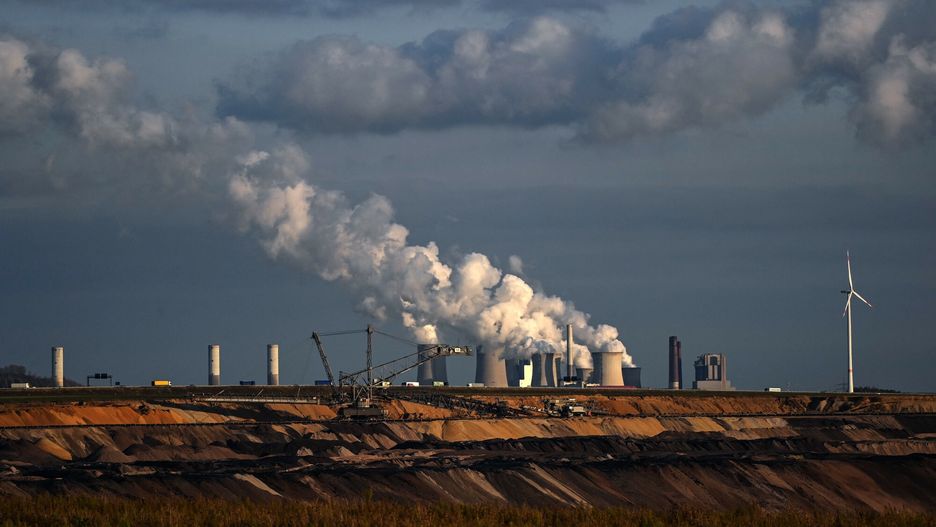 arch48
TOPSHOT - Open-cast lignite mining is seen near the coal-fired power station Neurath of German energy giant RWE in Garzweiler, western Germany, on October 27, 2021. - From October 31 to November 12, the 26th World Climate Conference (COP26) will take place in Glasgow, Scotland. Delegates from all over the world will meet there with the aim of pushing ahead more strongly with measures to combat the climate crisis. (Photo by Ina FASSBENDER / AFP)
INA FASSBENDER