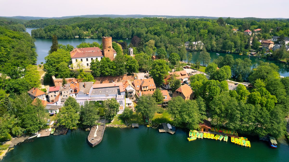 travel, tourism, landscape, water, view, city, architecture, summer, blue, nature, town, boat, europe, house, village, coast, mediterranean, sea, old, scenic, aerial, harbor, river, church, hill, vacation, cityscape, above, mountain, building, image, destination, attraction, panorama, tower, riviera