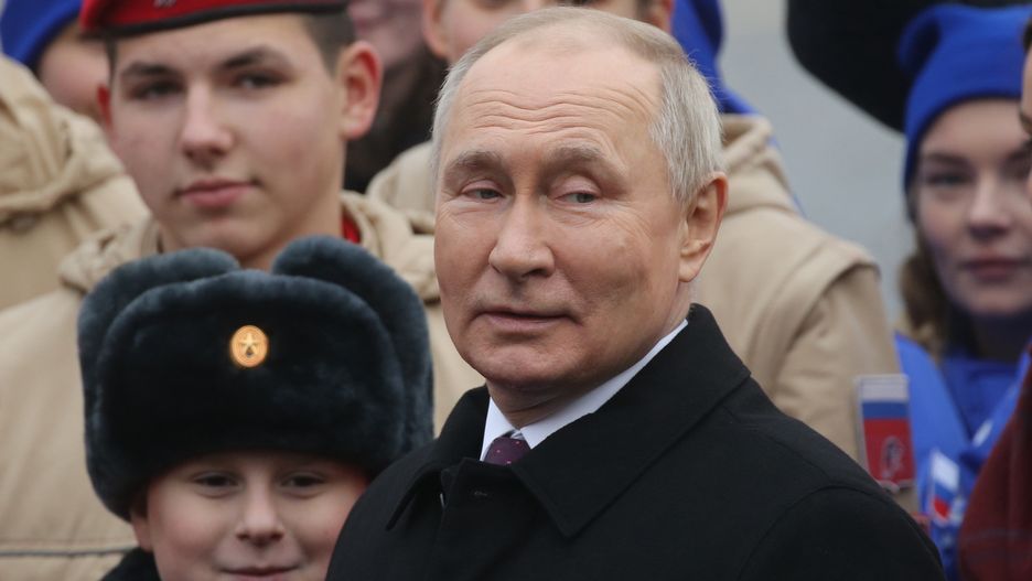 MOSCOW, RUSSIA - NOVEMBER 4:  (RUSSIA OUT) Russian President Vladimir Putin (C) poses for a photo during the ceremony, commemorating the National Unity Day, November 4,2023, in Moscow, Russia. Putin laid flowers at Moscow's Red Square, marking the national holiday, known as the Day of People's Unity, commemorates the popular uprising, which expelled Polish-Lithuanian occupation forces from Moscow by a militia in 1612.