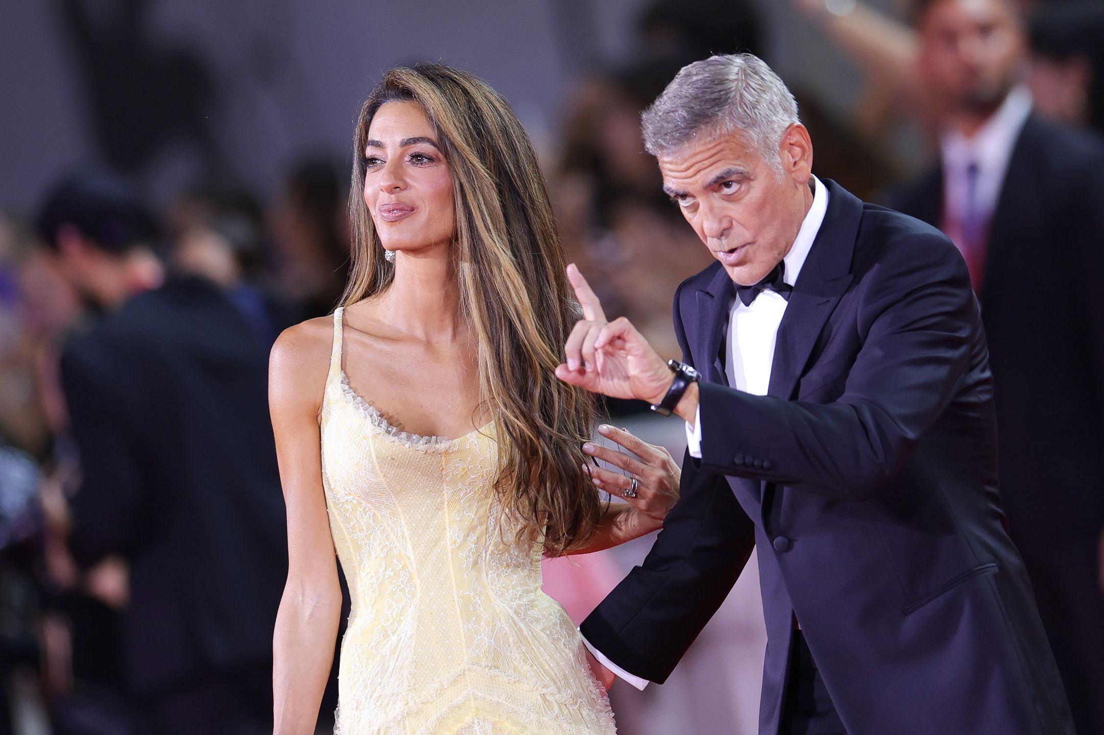 VENICE, ITALY - SEPTEMBER 01: Amal Clooney and George Clooney attends the "Wolfs" red carpet during the 81st Venice International Film Festival on September 01, 2024 in Venice, Italy. (Photo by Jacopo Raule/FilmMagic)