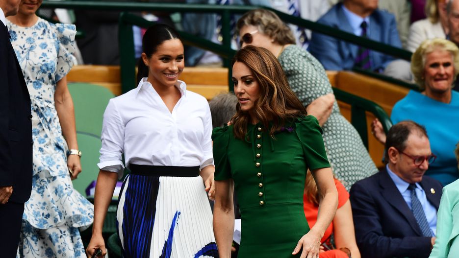 LONDON, ENGLAND - JULY 13: Catherine, Duchess of Cambridge and Meghan, Duchess of Sussex attend the Royal Box during Day twelve of The Championships - Wimbledon 2019 at All England Lawn Tennis and Croquet Club on July 13, 2019 in London, England. (Photo by Shaun Botterill/Getty Images)
