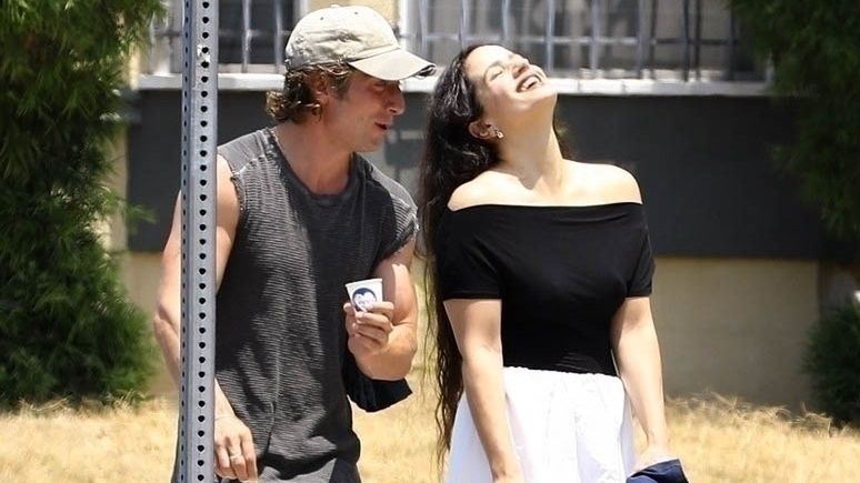 *PREMIUM-EXCLUSIVE* Happy and in love! Jeremy Allen White and Rosalia are all smiles amid split rumors while stepping out together in WeHo! **WEB EMBARGO UNTIL July 14, 2024 @ 7:50pm ET**BACKGRID / Backgrid USA / ForumJeremy Allen White, Rosalie, Sleeveless T-Shirt, Baseball Cap, White Pants, White Skirt, Black T-Shirt, Couple, Happy, In Love, Fashion, Style, Singer, Actor