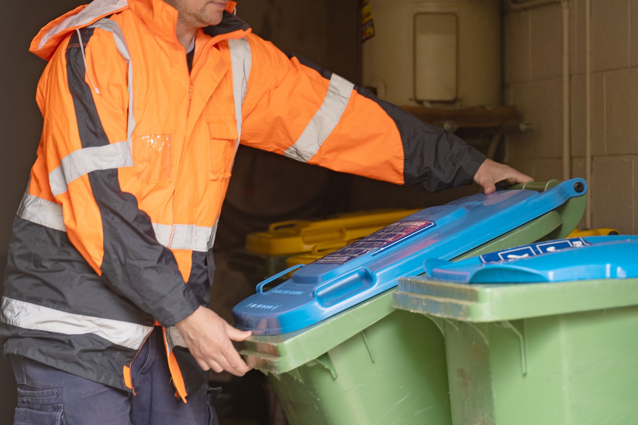 Garbage removal man
Garbage removal man picks up garbage bins from a building
Julia Gomina