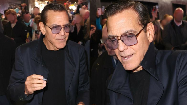 George Clooney w nowej fryzurze podczas podpisywania zdjęć