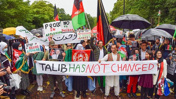LONDON, UNITED KINGDOM - 2021/08/21: Protesters hold a banner that says Talib Has Not Changed during the demonstration in Hyde Park.Demonstrators marched through Central London in protest against the Taliban takeover of Afghanistan, and called on the UK Government to impose sanctions on Pakistan and to help the people of Afghanistan. (Photo by Vuk Valcic/SOPA Images/LightRocket via Getty Images)SOPA Images