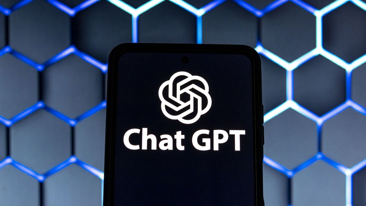 Photo illustration showing ChatGPT and OpenAI research laboratory logo and inscription at a mobile phone smartphone screen with a blurry background. Open AI is an app using artificial intelligence technology. Italy is the first European country to ban and block the robot Chat GPT application and website. ChatGPT is an artificial-intelligence (AI) chatbot developed by OpenAI and launched in November 2022 using reinforcement learning techniques both from machine and human feedback. Amsterdam, the Netherlands on April 1, 2023 (Photo by Nicolas Economou/NurPhoto via Getty Images)
