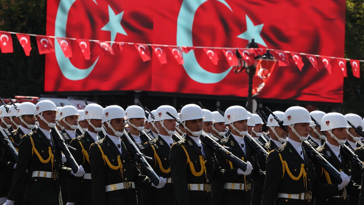 ANKARA, TURKIYE- AUGUST 30: Military personnel parade as Turkey’s SoloTürk F-16 demonstration team performed an air show over Anıtkabir in Ankara during Victory Day celebrations on August 30, 2025 in Ankara, Türkiye. (Photo by Ugur Yildirim /dia images via Getty Images)
