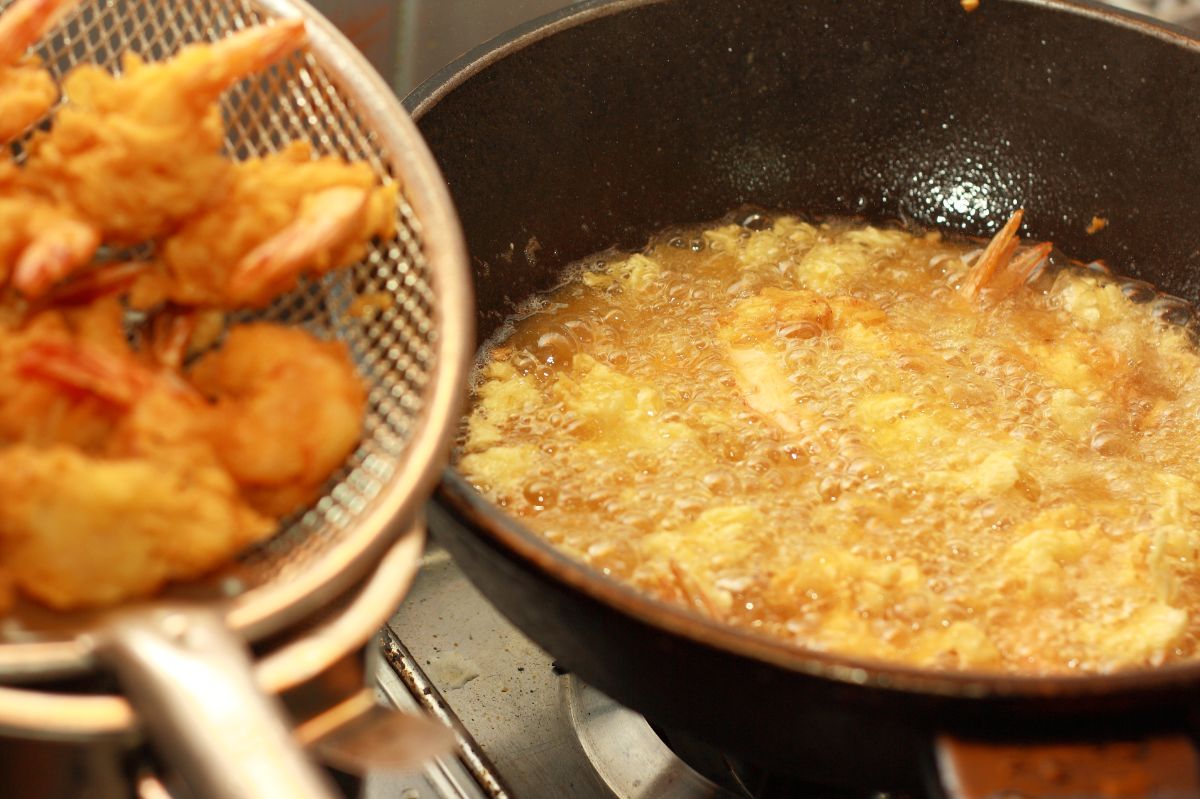 Pour onto the pan. The fat won't splatter.