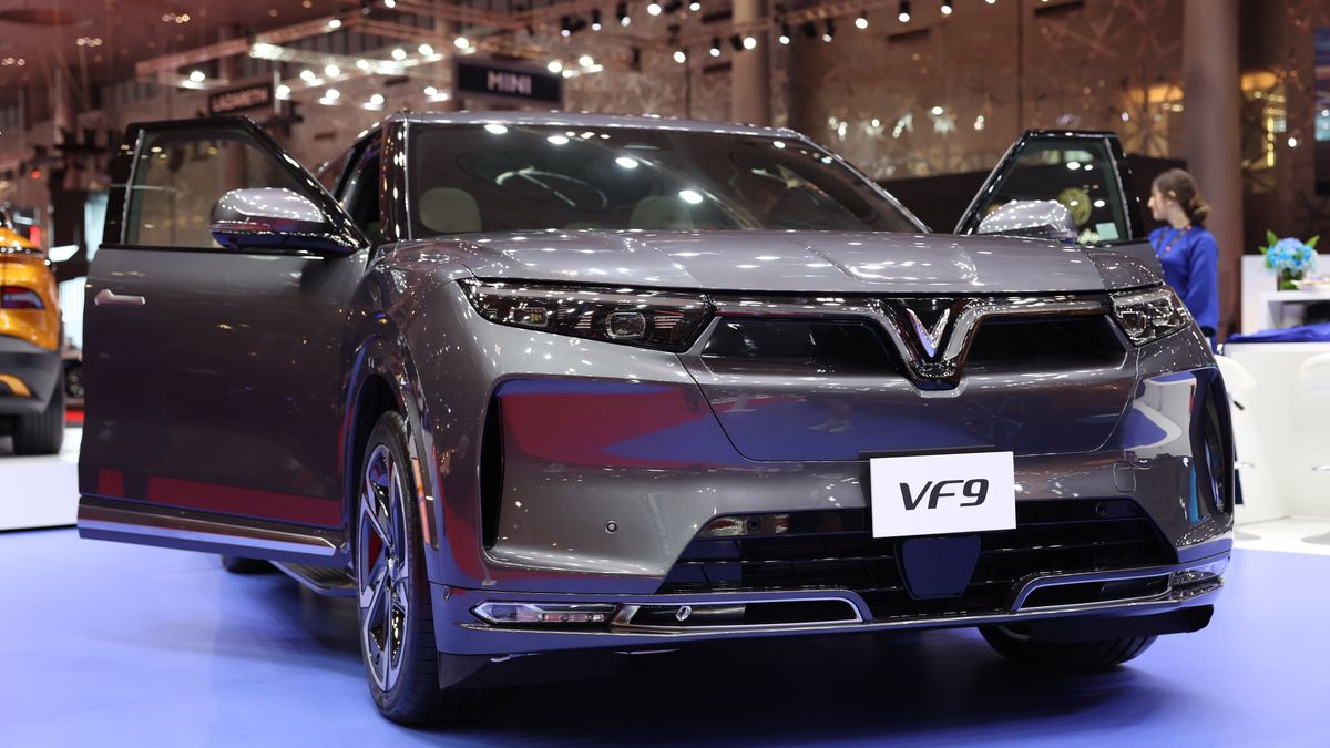 A Vinfast VF9 electric vehicle on the opening day of the Geneva International Motor Show Qatar 2023, in Doha, Qatar, on Friday, Oct. 6, 2023. Geneva's auto show is abandoning its namesake location in Switzerland and instead will be held in Doha, switching its traditionally chilly venue in alpine Europe to the balmy Middle East. Photographer: Christopher Pike/Bloomberg via Getty Images