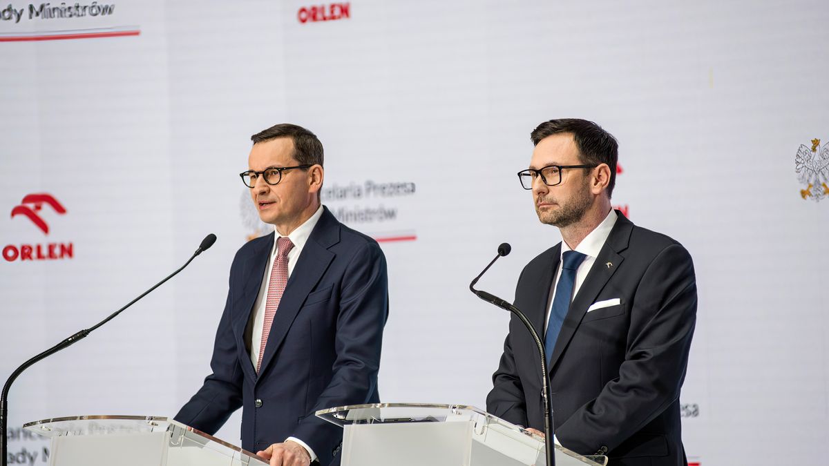 WARSAW, POLAND - 2023/04/17: Prime Minister Mateusz Morawiecki (L) and Daniel Obajtek (R), the President and CEO of the Polish Oil Company ORLEN speak at the press conference in Warsaw. Daniel Obajtek, the President and CEO of the Polish Oil Company ORLEN, announced the details of the planned investments in Small Modular Reactors (SMR) for Poland. For this purpose, the company Orlen Synthos Green Energy (OSGE) was established, supported by the Polish billionaire - Michal Solowow. OSGE will buy reactors from US-based GE Hitachi. (Photo by Attila Husejnow/SOPA Images/LightRocket via Getty Images)