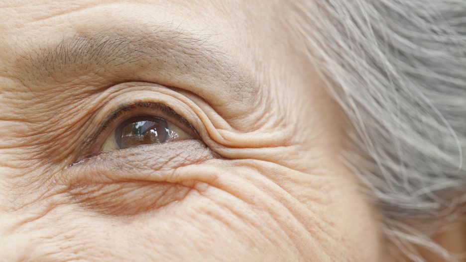 Close up of older Chinese woman's eye
FangXiaNuo