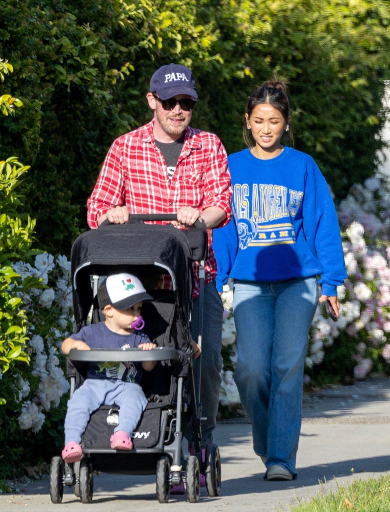 Macaulay Culkin on a family walk