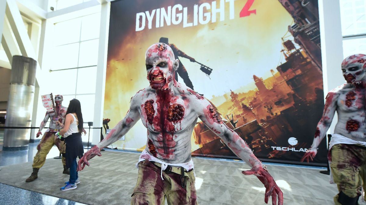 Temporary
Zombie character in front of a poster for the game Dying Light 2 at the 24th Electronic Expo, or E3 2018, in Los Angeles, California on June 12, 2018, where hardware manufacturers, software developers and the video game industry present their new games. / AFP PHOTO / Frederic J. BROWN
FREDERIC J. BROWN