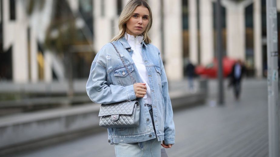 DUSSELDORF, GERMANY - FEBRUARY 18: Scarlett Gartmann wearing Givenchy skirt and jacket, Weekday sweater and Chanel bag on February 18, 2020 in Dusseldorf, Germany. (Photo by Jeremy Moeller/Getty Images)