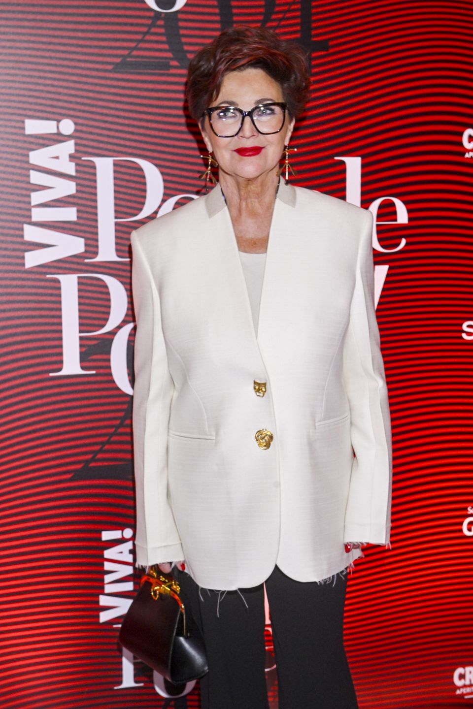 Jolanta Kwaśniewska w białym żakiecie 