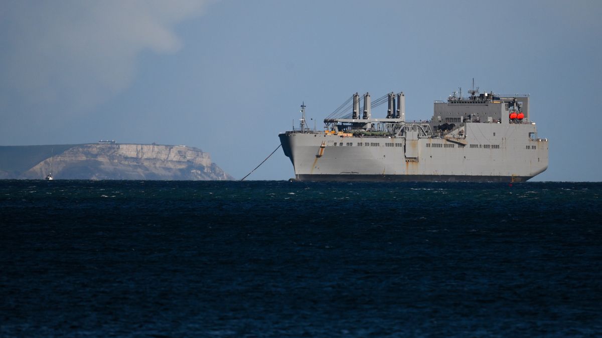 WEYMOUTH, ENGLAND - MARCH 28: American ship the USNS Red Cloud (T-AKR 313) Military Sealift Command, Large, Medium-Speed Roll-on/Roll-off Watson-class vehicle cargo ship (LMSR) is moored in the bay, on March 28, 2026 in Weymouth, United Kingdom. It functions as a floating warehouse for U.S. Army pre-positioning stocks, storing tanks, trucks, and equipment at sea to support rapid deployment, humanitarian aid, and combat missions. (Photo by Finnbarr Webster/Getty Images)