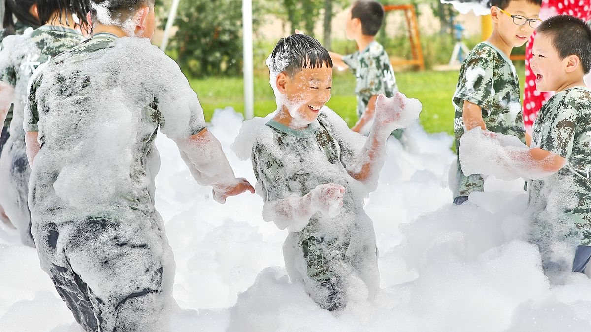 QINHUANGDAO, CHINA - JULY 09: Children play in bubble at a farm on July 9, 2020 in Qinhuangdao, Hebei Province of China. (Photo by Cao Jianxiong/VCG via Getty Images)