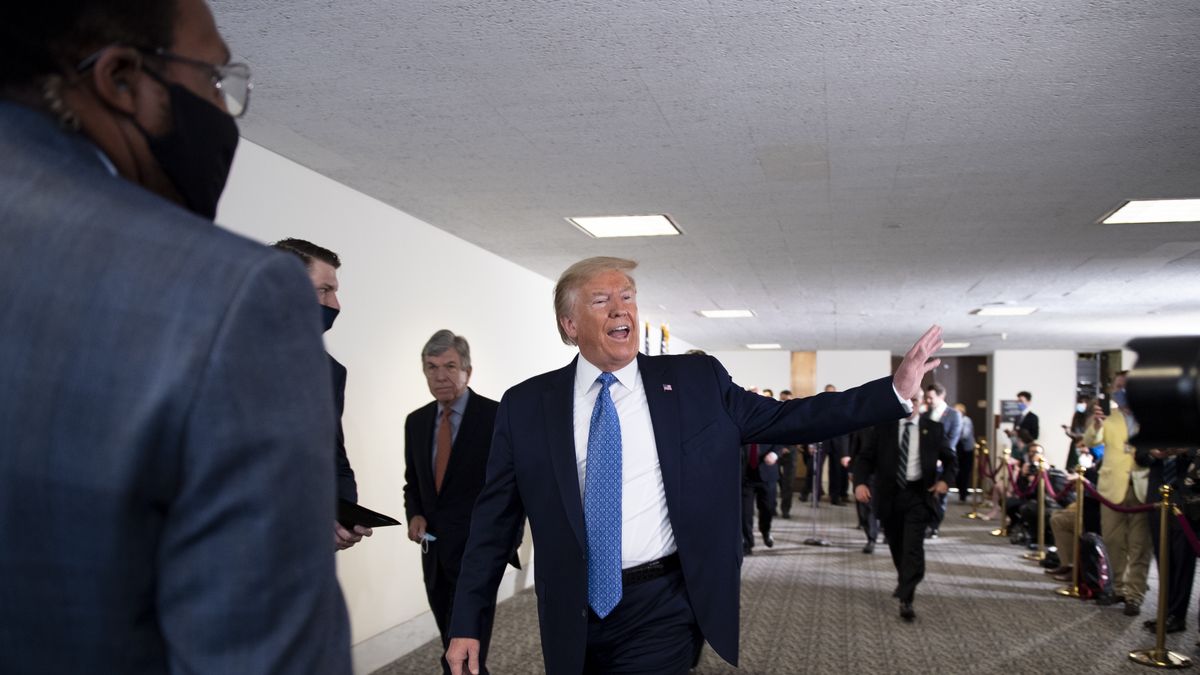UNITED STATES - MAY 19: President Donald Trump waves to the press as he departs from a Senate Republican Policy Luncheon in Hart Building on Tuesday, May 19, 2020. (Photo by Caroline Brehman/CQ-Roll Call, Inc via Getty Images)